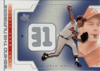 2002 E-X Behind the Numbers Game Jersey #14 Greg Maddux Jersey Relic 